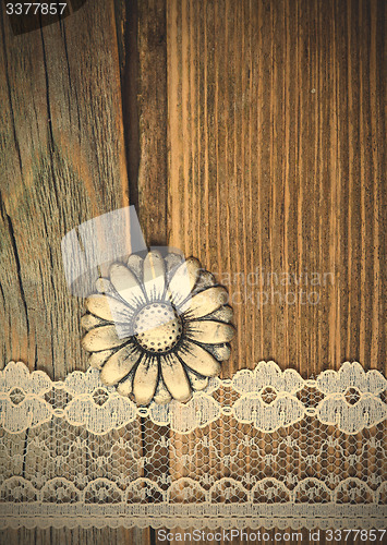 Image of vintage button and lace tape