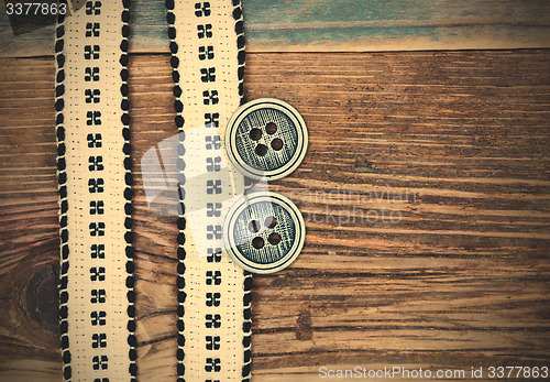 Image of Vintage ribbons with embroidered pattern and ancient classical b