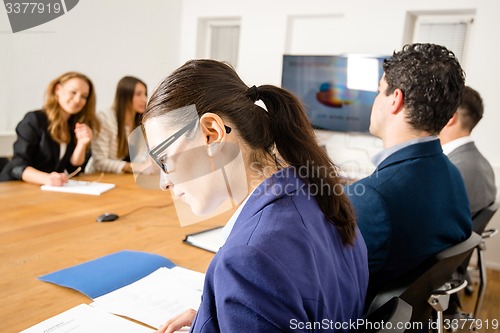 Image of Checking facts during business meeting