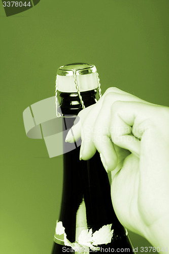 Image of Opening champagne bottle