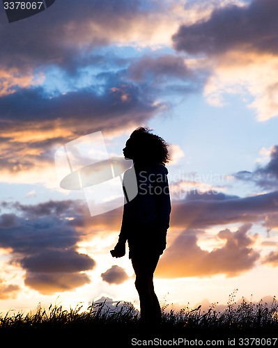 Image of silhouette of female runner