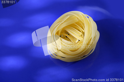 Image of Uncooked pasta tagliatelle