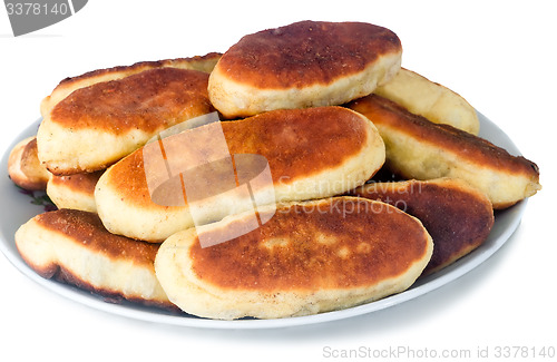 Image of Cakes on a ceramic dish on a white background.