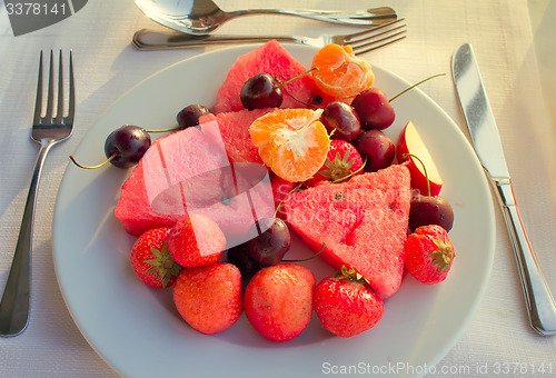 Image of Fruit dessert, diverse fruits and berries.