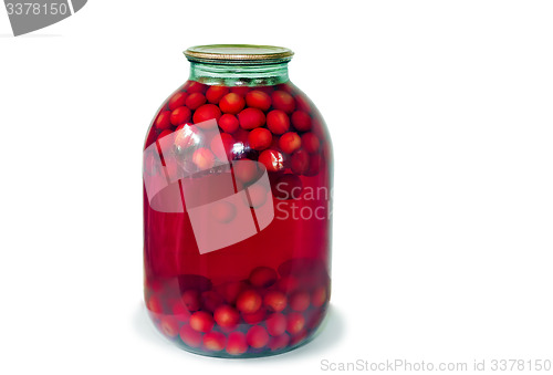 Image of Home canning: glass cylinders with cherry compote on white backg