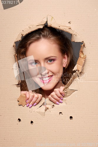 Image of Looking through paper hole