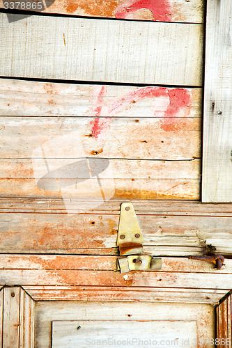 Image of brown  morocco in africa the old wood  facade red