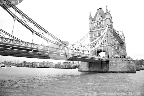 Image of london tower in england old bridge and the cloudy sky