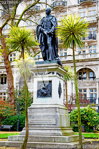 Image of historic   marble and statue in old city  