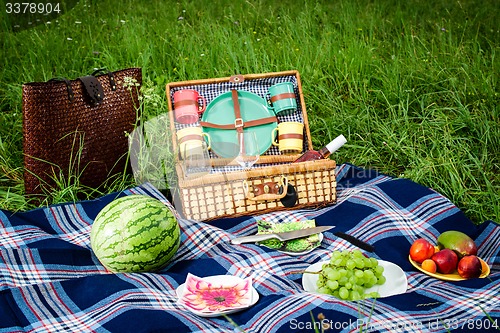 Image of Picnic blanket and basket 