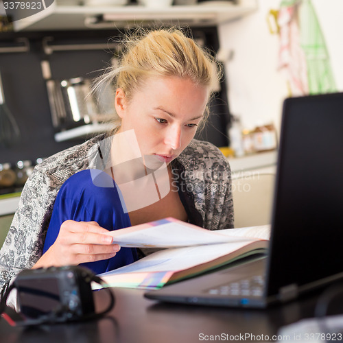 Image of Female freelancer working from home.