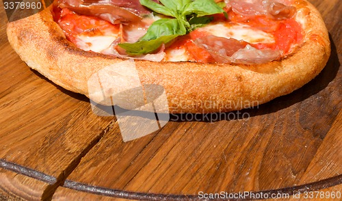 Image of Fresh pizza on a thick dough