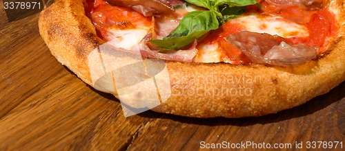 Image of Fresh pizza on a thick dough