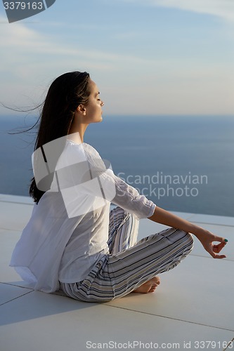 Image of young woman practice yoga