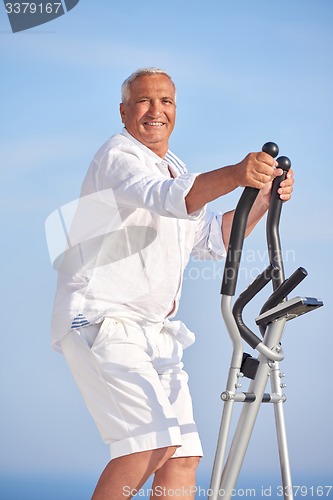 Image of healthy senior man working out