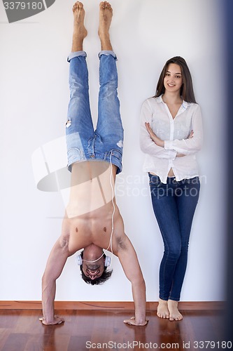 Image of happy young romantic couple have fun and  relax at home indoors