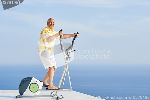 Image of healthy senior man working out