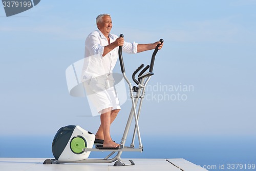 Image of healthy senior man working out