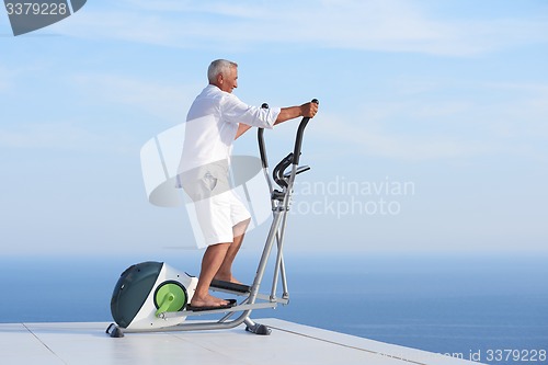 Image of healthy senior man working out