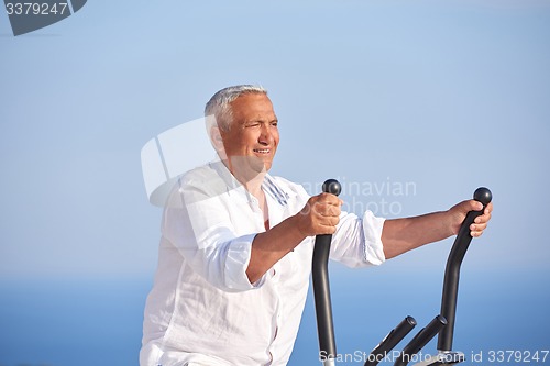 Image of healthy senior man working out