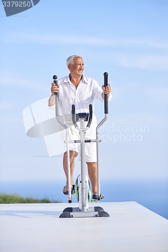 Image of healthy senior man working out