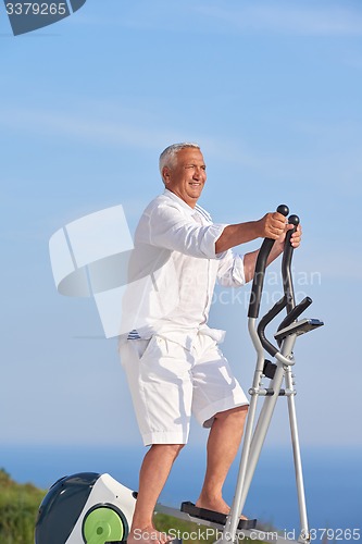 Image of healthy senior man working out