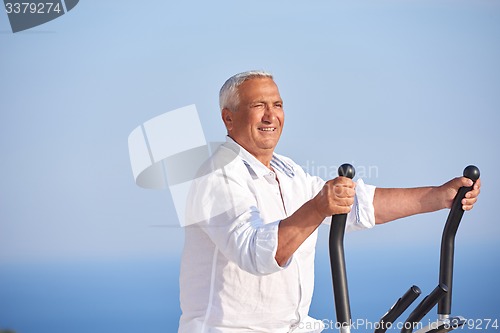 Image of healthy senior man working out