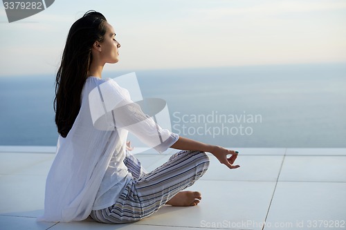 Image of young woman practice yoga