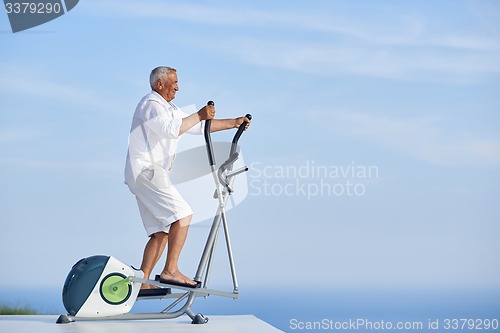 Image of healthy senior man working out