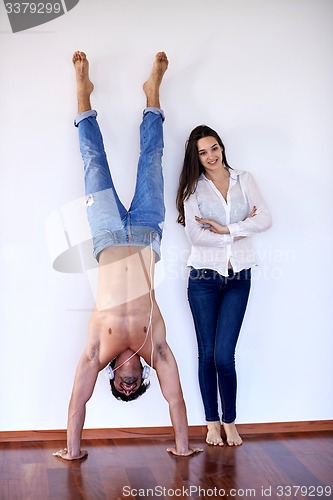 Image of happy young romantic couple have fun and  relax at home indoors