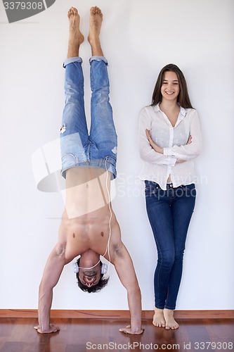 Image of happy young romantic couple have fun and  relax at home indoors