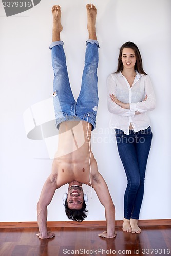 Image of happy young romantic couple have fun and  relax at home indoors