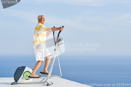 Image of healthy senior man working out