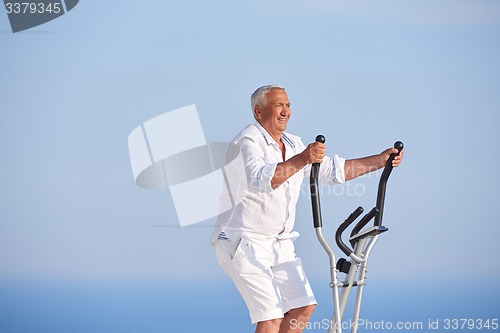 Image of healthy senior man working out