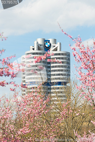 Image of BMW headquarters tower office building in spring blossoming Olym