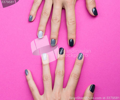 Image of Delicate female hands with a stylish neutral manicure
