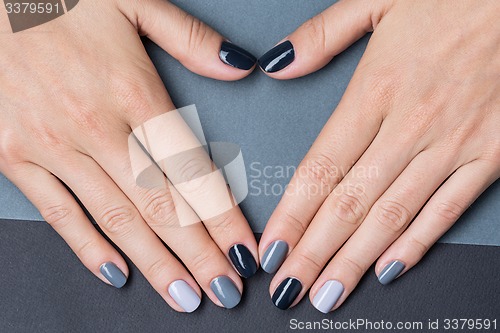 Image of Female hands with a stylish neutral manicure