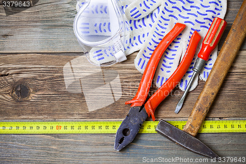 Image of old tools on aged boards