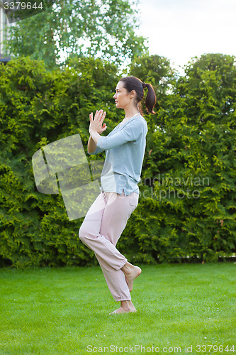 Image of adult woman doing yoga