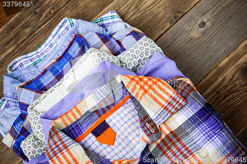 Image of shirts in a stack