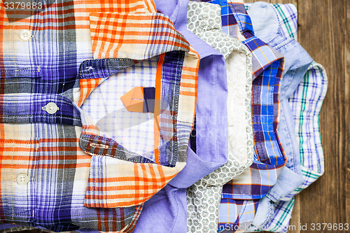 Image of shirts in pile