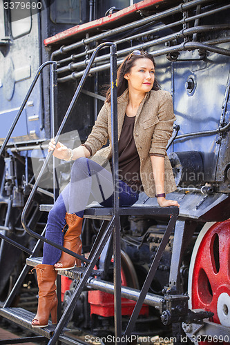 Image of retro travel fashion portrait of a beautiful adult woman