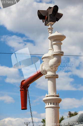 Image of antique water column for fueling steam locomotives