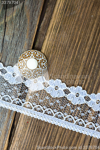 Image of vintage button and lace tape