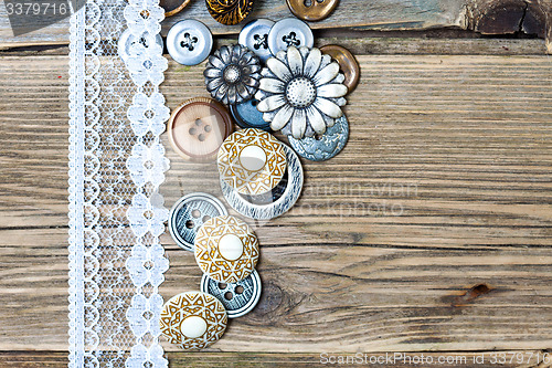 Image of vintage buttons and lace tape