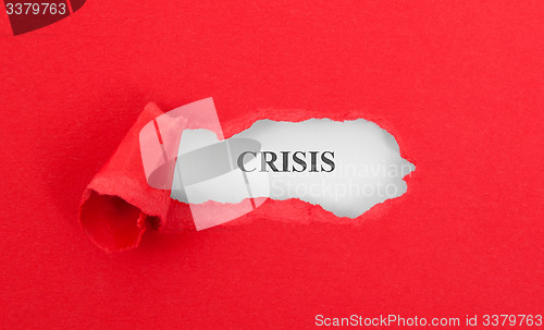 Image of Text appearing behind torn red envelop