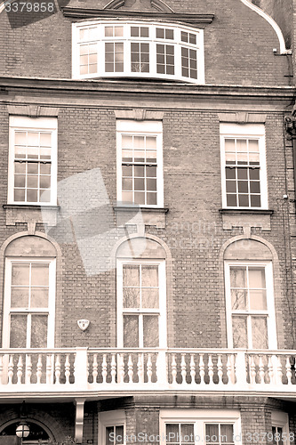 Image of in  old red brick wall and  window