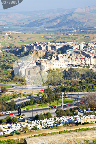 Image of from high in the village   cemetery    morocco  and construction