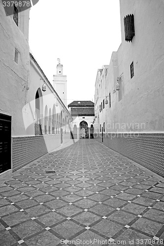 Image of old   brick tower in morocco africa village and the sky