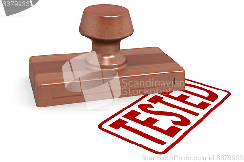 Image of Wooden stamp tested with red text